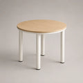 Runder Tisch mit Holzfurnier und Metallbeinen